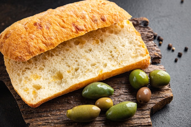 ciabatta fresh bread ready to eat meal snack on the table copy space food background rustic