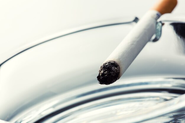 Cigarette on ashtray