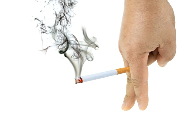 Cigarette burns with smoke in Men's hand at isolated white background