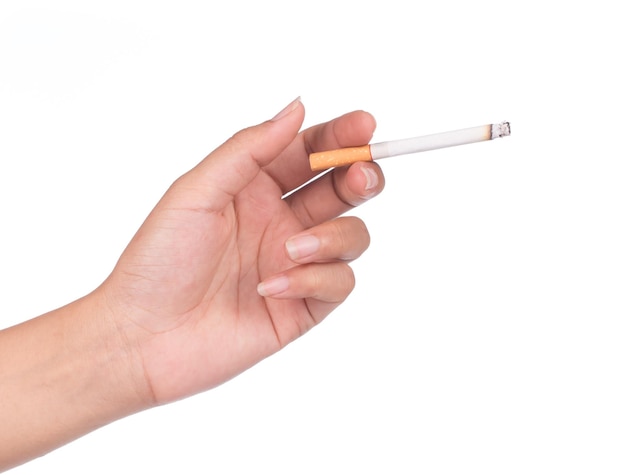 Cigarette in hand isolated on White background.