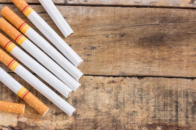 Cigarette roll on old wooden table