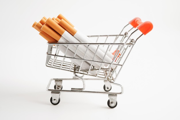 Cigarette in shopping cart cost trading marketing and production No smoking concept