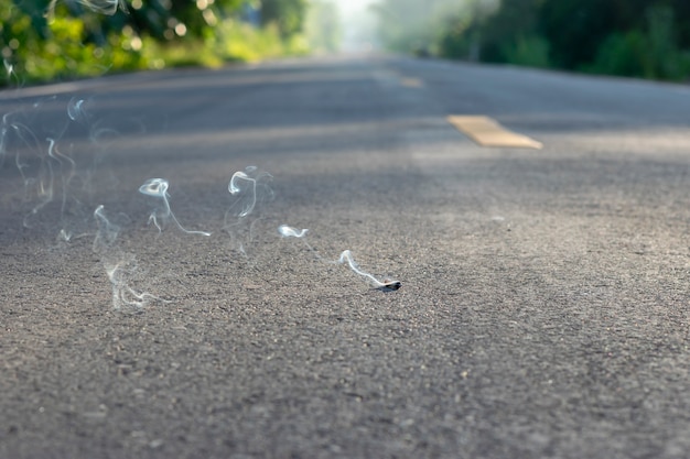 Cigarette smoke on the street.