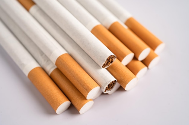 Cigarette tobacco in roll paper with filter tube No smoking concept