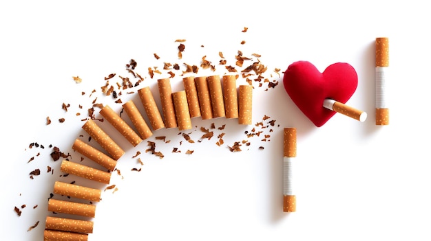 Cigarettes arranged to show a break leading to a heart symbolizing quitting smoking for health