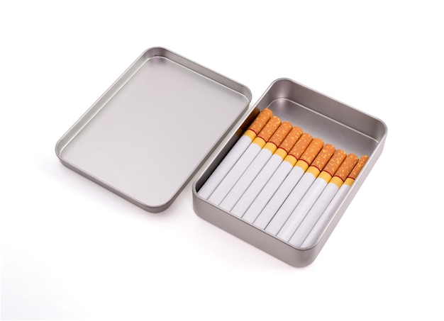 Cigarettes in metal box isolated on white background