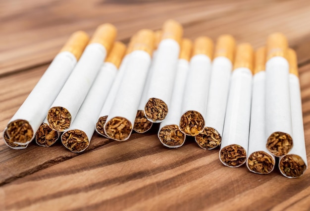 Cigarettes on wooden table