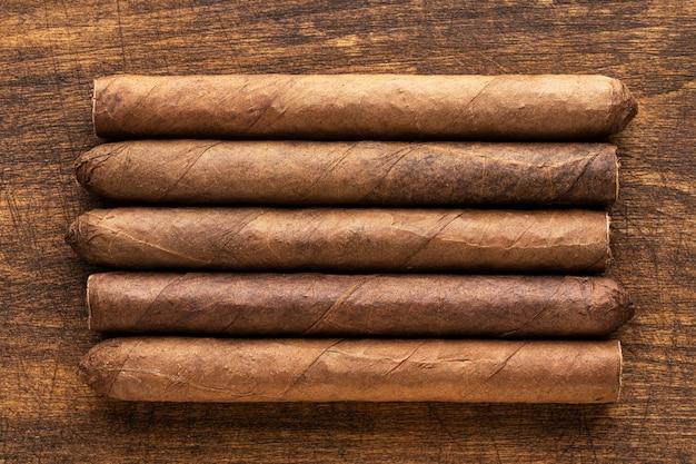 Photo cigars on a warm wooden table