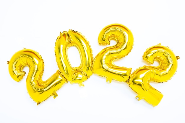 Cijfers 2022 van gouden ballonnen. Nieuwjaarsvakantie