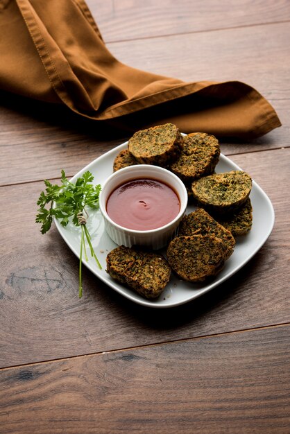 Cilantro cake or Kothimbir Vadi is a popular maharashtrian cuisine made with cilantro leaves