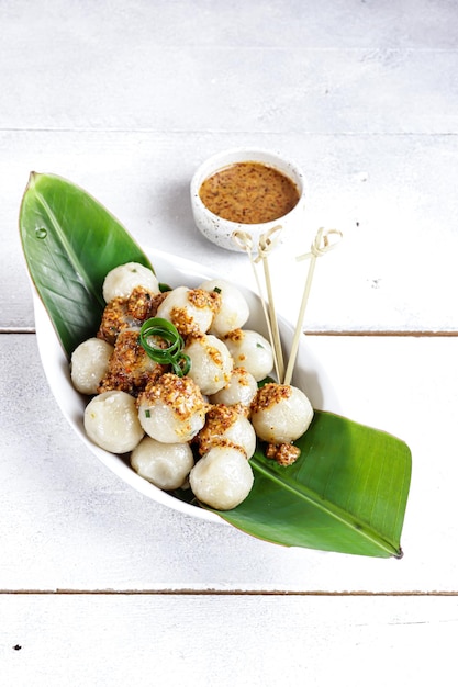Cilok is west java indonesia traditional snack made from\
tapioca flour served with peanuts sauce