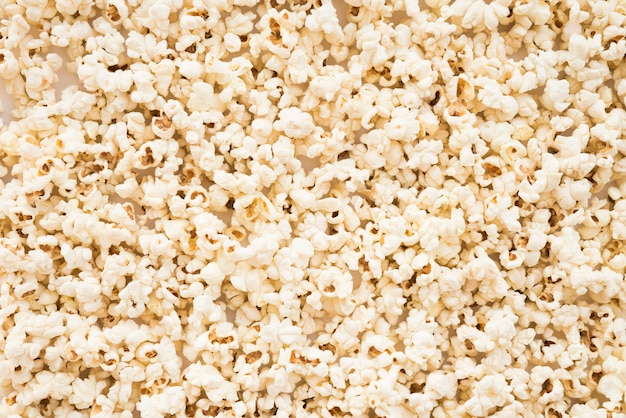 Photo cinema concept with popcorn background