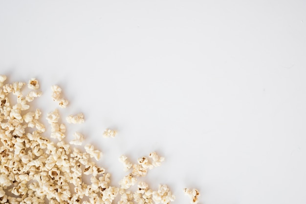 Photo cinema concept with popcorn background