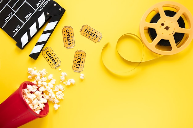 Cinema elements on yellow background