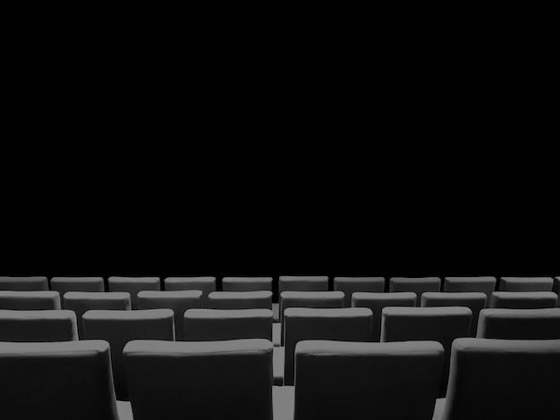 Cinema movie theatre with seats rows and a black copy space\
background