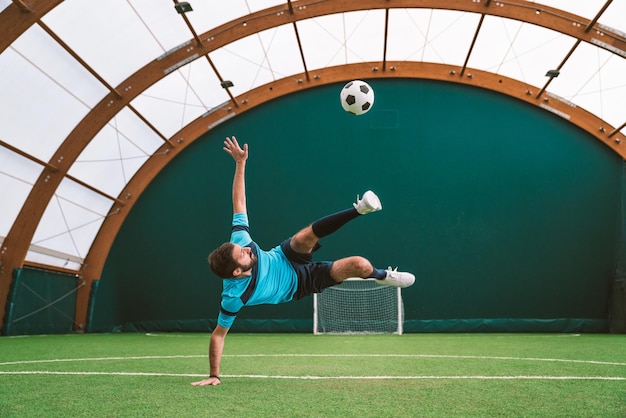 Cinematic image of a soccer freestyle player making tricks with the ball