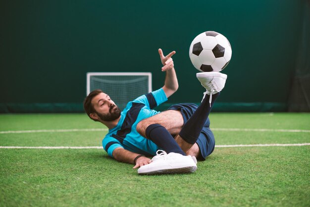 Cinematic image of a soccer freestyle player making tricks with the ball