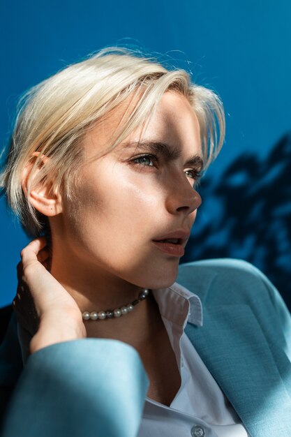 Cinematic image of a young beautiful business woman. portrait of an employee in his office