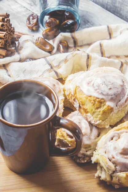 Cinnabon cinnamon and cream for tea. Selective focus.