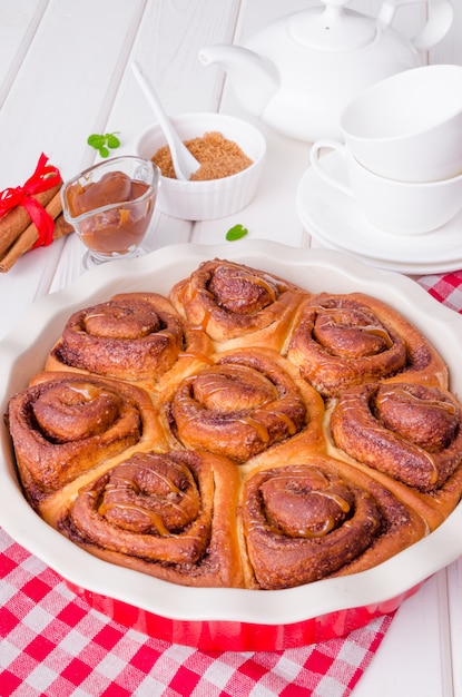 Cinnabon. Yeast buns with cinnamon and caramel sauce