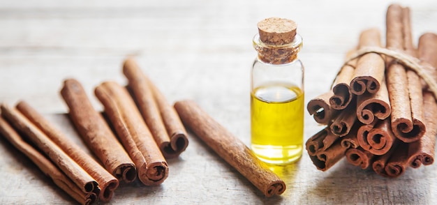 Cinnamon essential oil in a small bottle