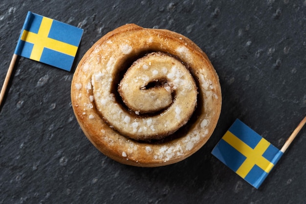 Cinnamon rolls buns on wooden table Kanelbulle Swedish dessertxA