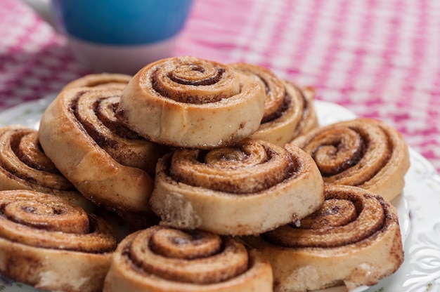 Cinnamon rolls on a white plate