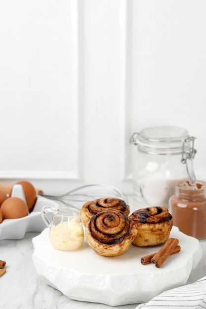 Cinnamon Rolls with Cheese Sauce Baking Process Concept