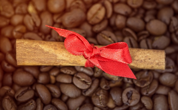 Cinnamon stick on coffee beans