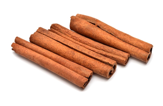 Cinnamon sticks isolated on a white background Perfectly retouched full depth of field on the photo Top view flat lay
