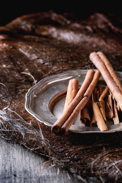 Cinnamon sticks on plate