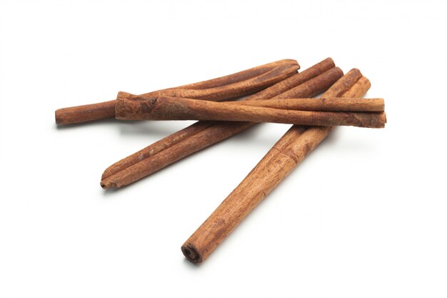 Cinnamon sticks on white 