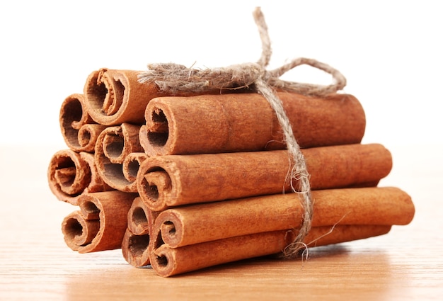 Cinnamon sticks on wooden table