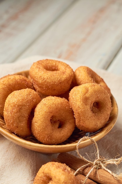 Cinnamon and Sugar Mini Donuts on a rustic background