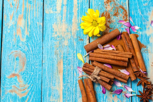 Cinnamon on wooden board.