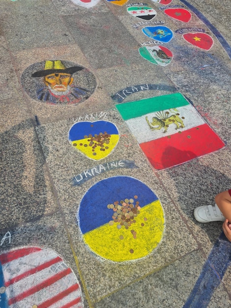 A circle of coffee and a flag on the ground