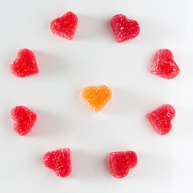 circular arrangement of sweet red fruit jelly in the shape of a heart.