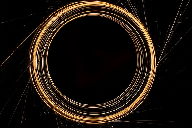Circular lights with sparks on a black background