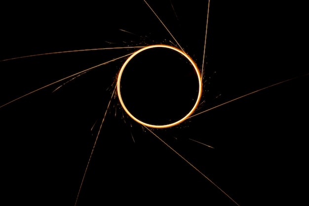 Circular lights with sparks on a black background