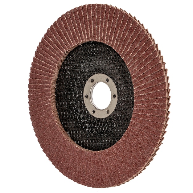 A circular saw blade with a copper ring and the word's on it