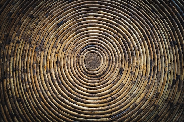 Circular texture of a bamboo bowl. under a bamboo roof. twisted into a spiral bamboo