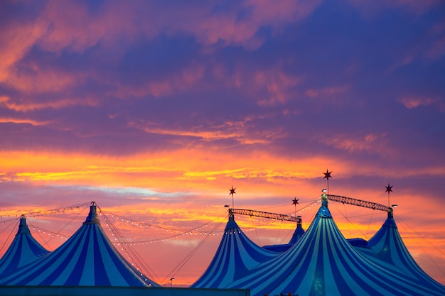 Circus tent in a dramatic sunset sky colorful