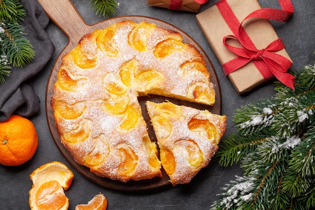 Citrus dessert holiday cake with tangerines