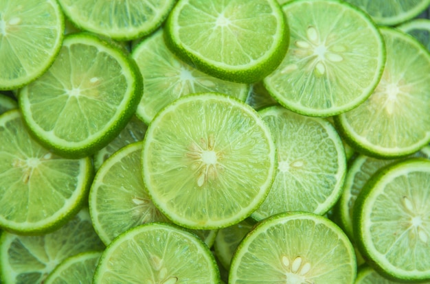 Citrus fruit of lime slices background