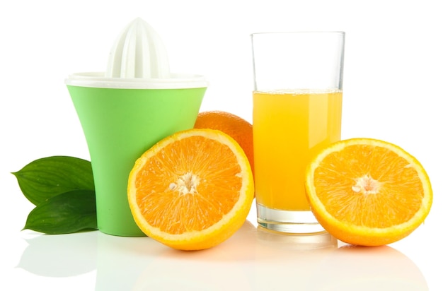 Citrus press glass of juice and ripe oranges isolated on white