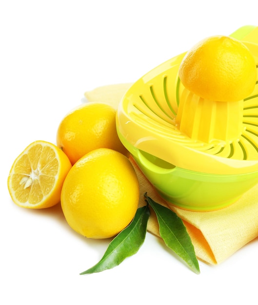 Premium Photo Citrus press and lemons isolated on white