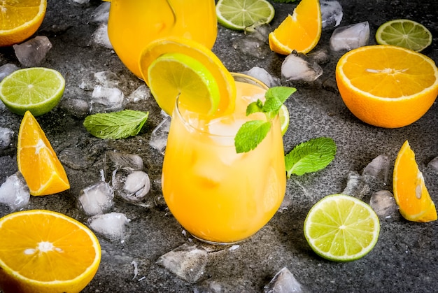 Citrus punch with oranges and lime, with mint sprigs, chilled with ice