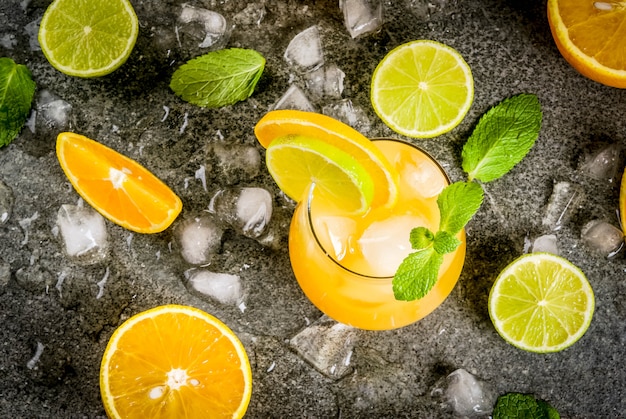 Citrus punch with oranges and lime, with mint sprigs, chilled with ice