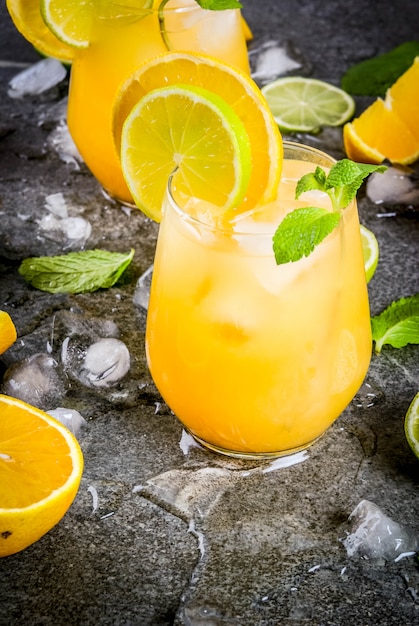 Citrus punch with oranges and lime, with mint sprigs, chilled with ice