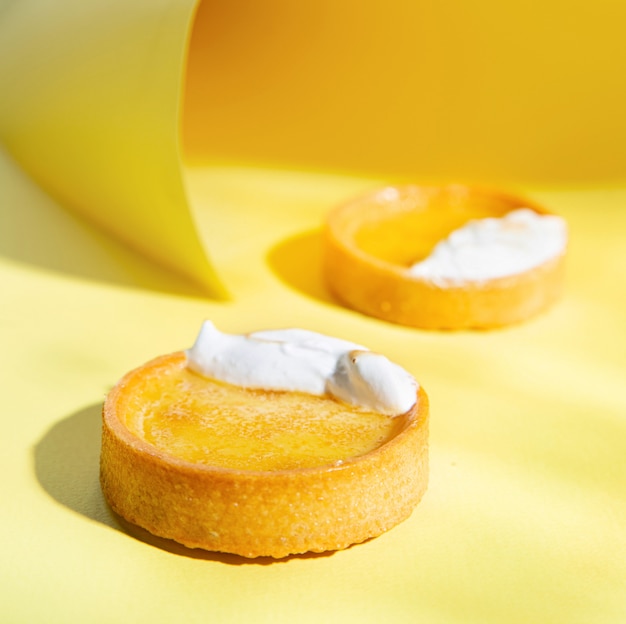 Citrus tartlets on the yellow paper